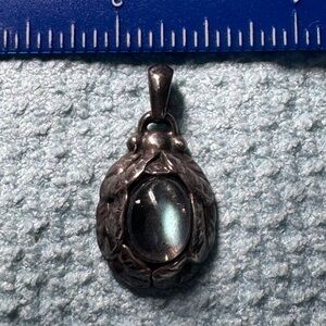 Artisan Silver Necklace with Iridescent Gem